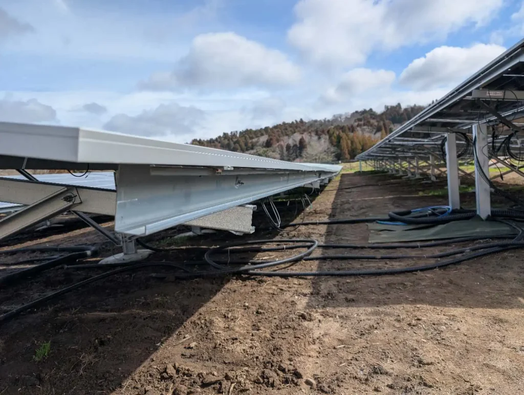 SR Solar ground mounting system featuring integrated drainage channels and organized cable management