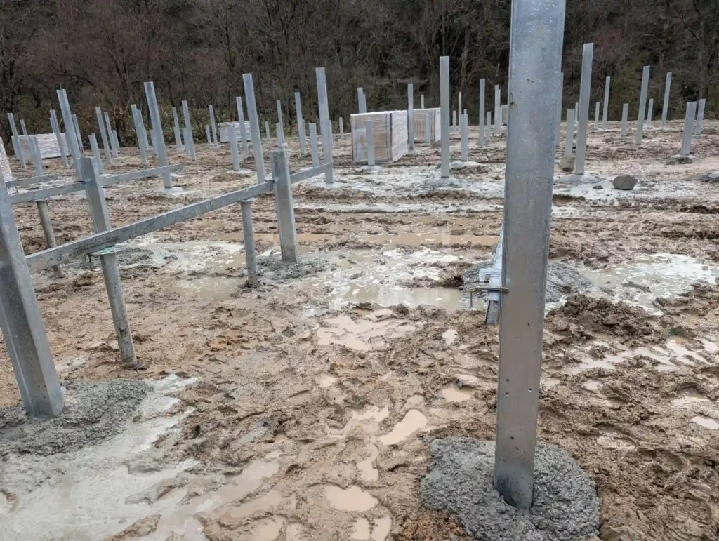 SR Solar galvanized steel ground mounting posts installed in concrete foundation for a large-scale project