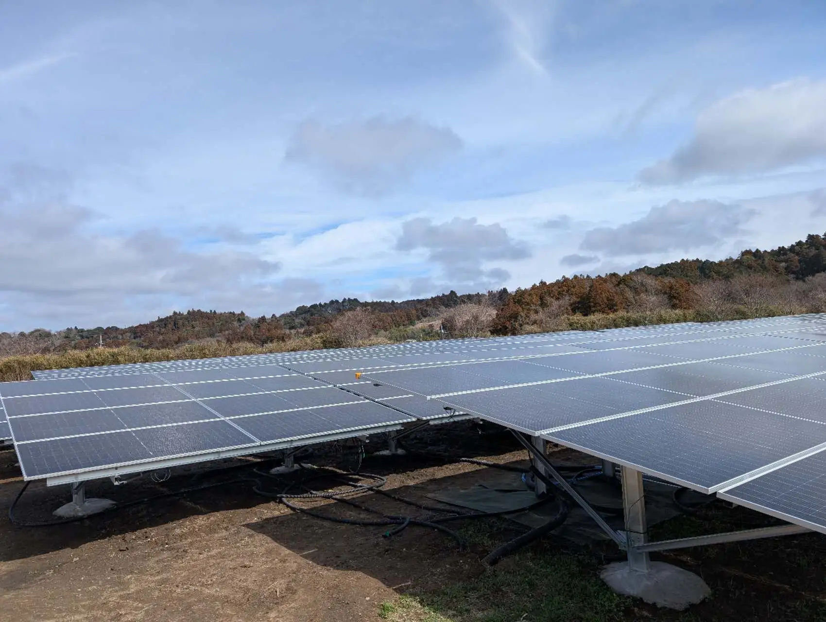 Large solar panel array by SR Solar designed with optimized tilt for effective water runoff