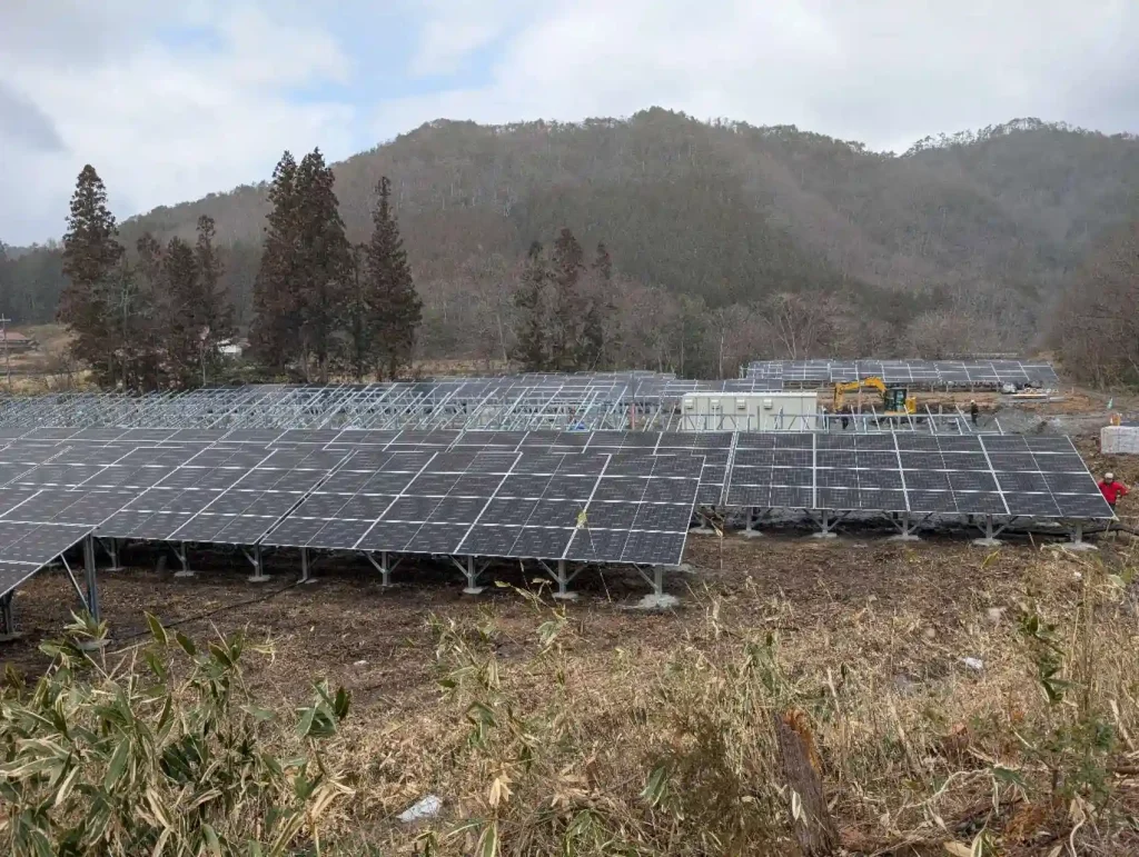 Wide view of a utility-scale solar farm in Japan utilizing SR Solar ground mounting solutions