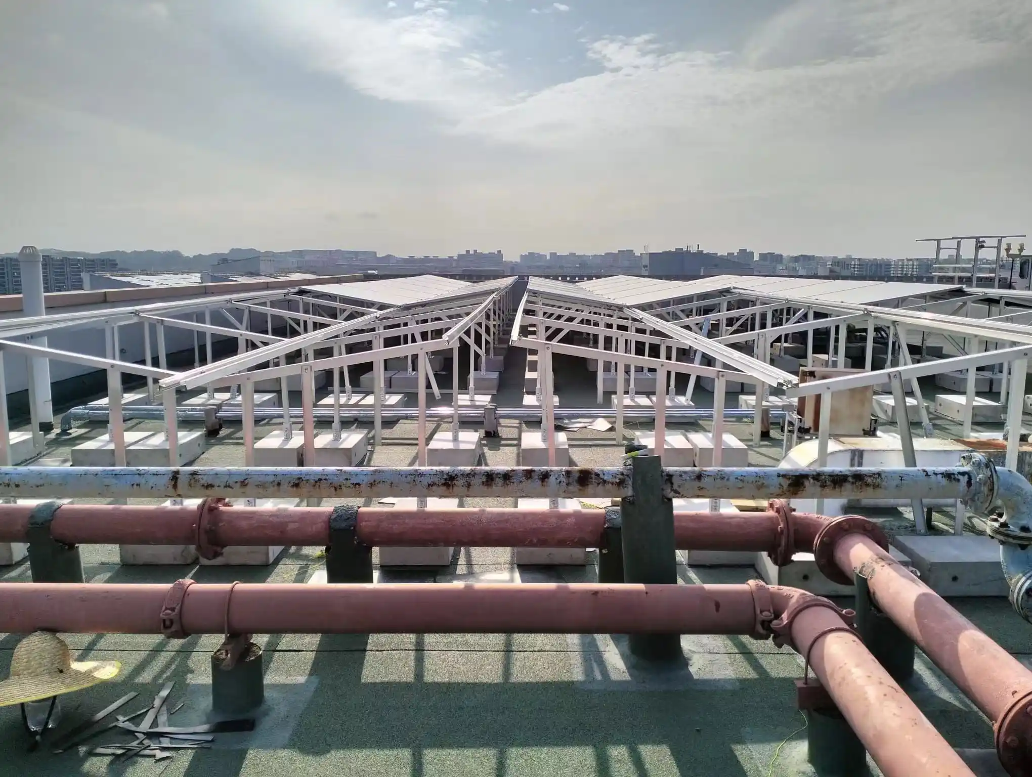 SR Solar ballasted solar mounting system installed on a flat concrete roof for a commercial project in Singapore, manufactured by SR Solar factory