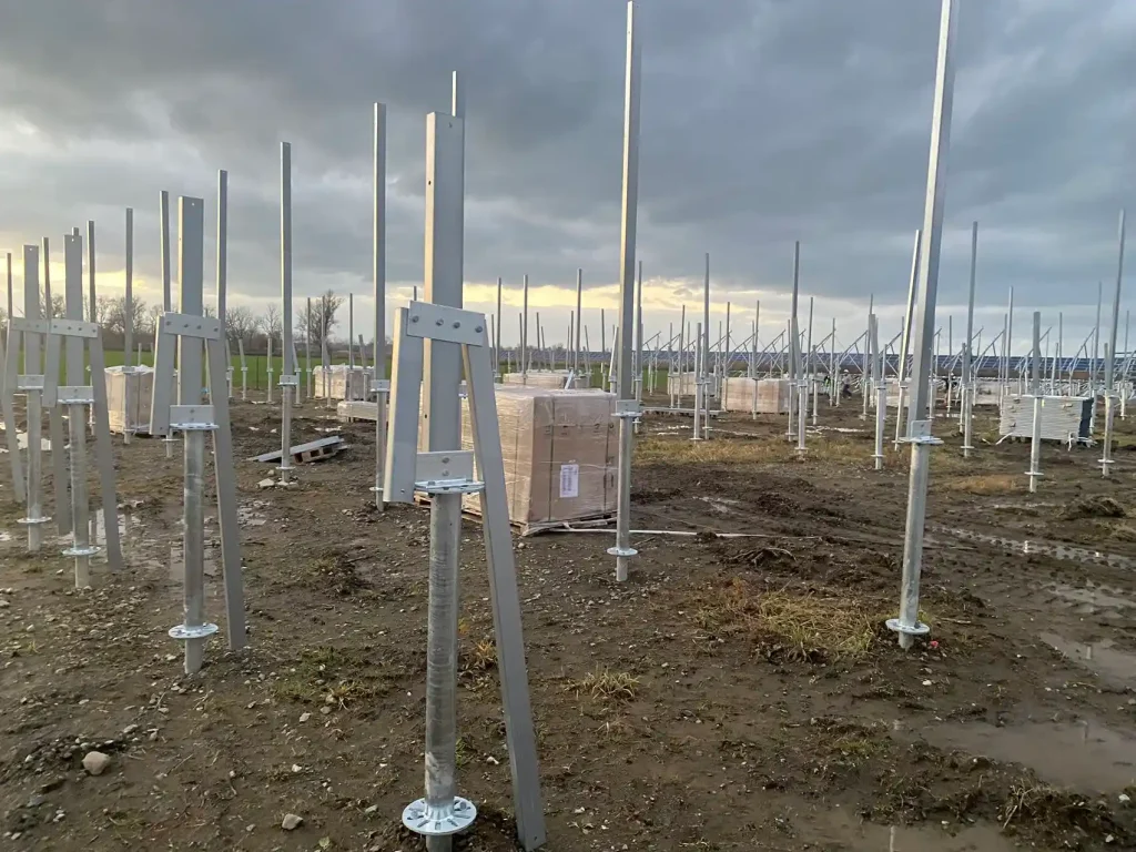 Industrial driven pile foundation posts for solar racking arrays, manufactured by SR Solar for utility-scale applications.