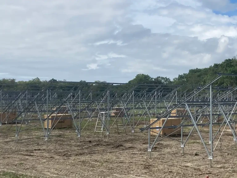 SR Solar large-scale ground mounting structure array with Jinko solar modules on site in Hokkaido.