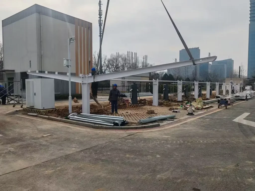 Completed SR Solar industrial solar carport mounting system integrated with EV charging stations in the Philippines.