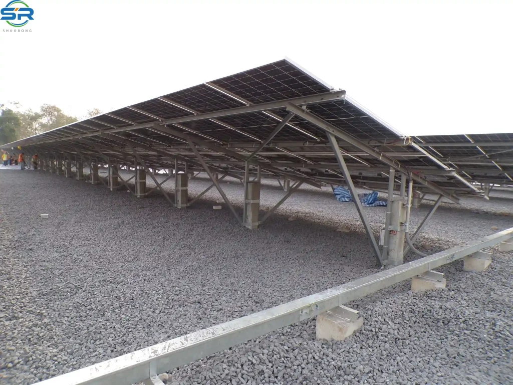 Utility-scale solar farm project utilizing SR Solar ramming post ground mounting solutions on a gravel-covered site.