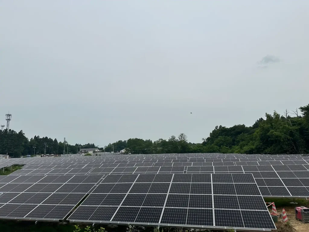 An expansive utility-scale solar farm matrix using fixed ground mounting structures manufactured by SR Solar for the Iwate Hanamaki project.