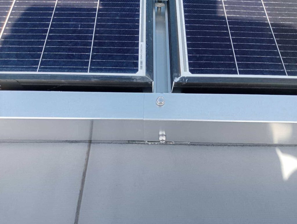 Heavy-duty structural tripod support bracket and anodized aluminum rail interface engineered by SR Solar.