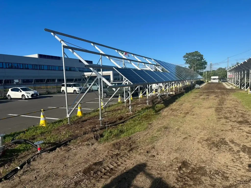 Heavy-duty aluminum ground mounting solutions engineered by SR Solar for a corporate solar project in Japan.