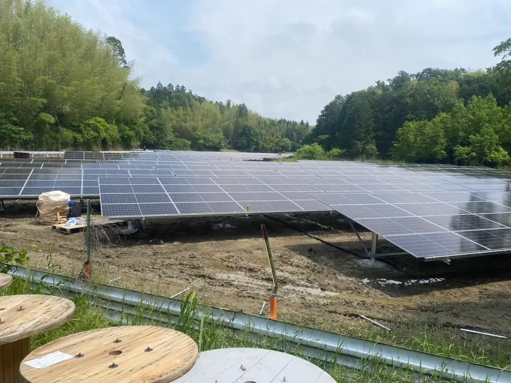 Ground-mounted solar panel rows supported by heavy-duty SR Solar aluminum and steel structures at Mie Tsu project.
