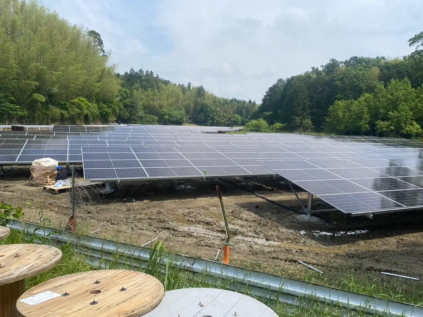 Ground-mounted solar panel rows supported by heavy-duty SR Solar aluminum and steel structures at Mie Tsu project.