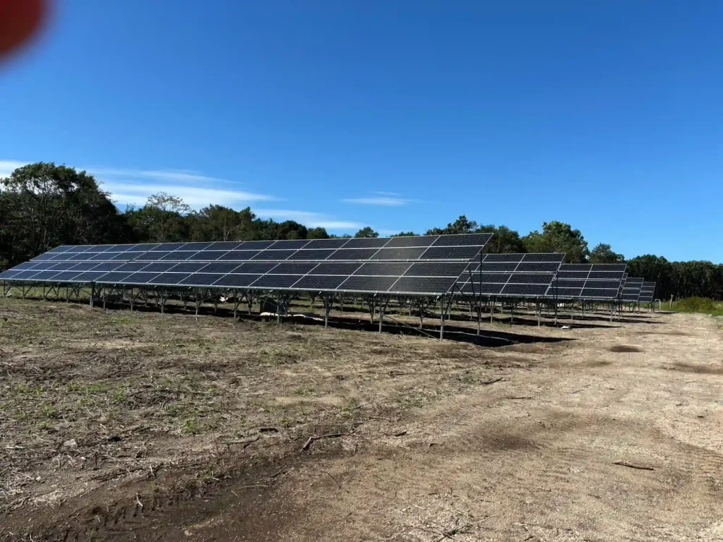 Continuous rows of high-strength PV module racking brackets manufactured factory-direct by SR Solar.