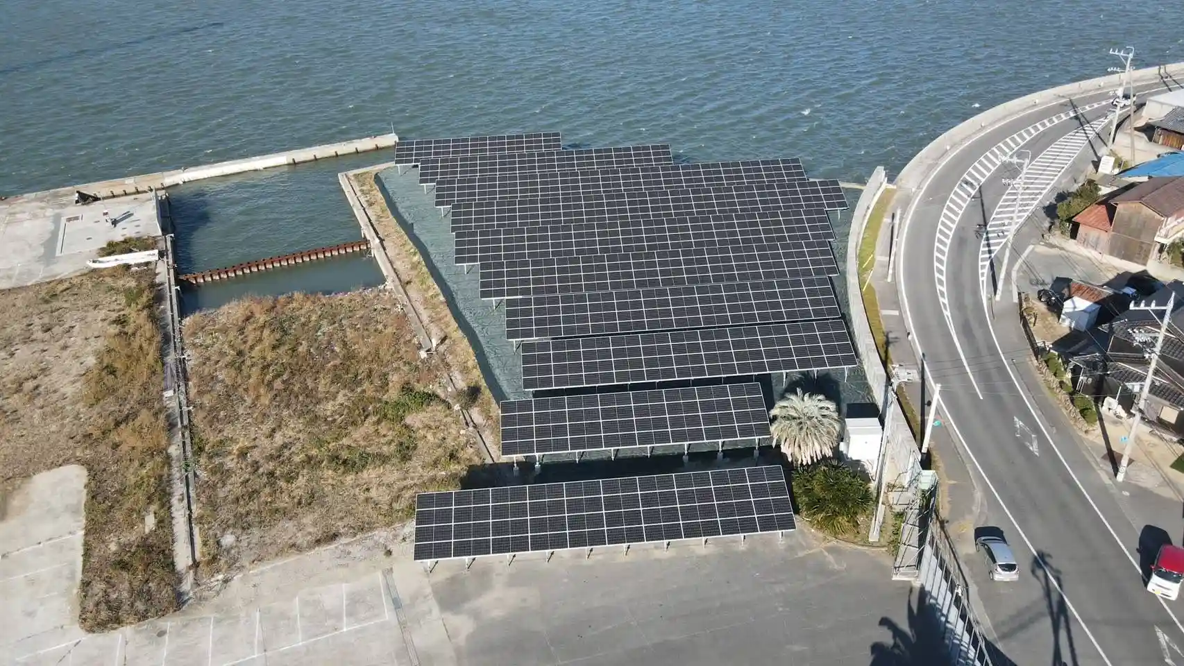 Drone shot of optimized ground utility racking systems manufactured factory-direct by wholesale supplier SR Solar.