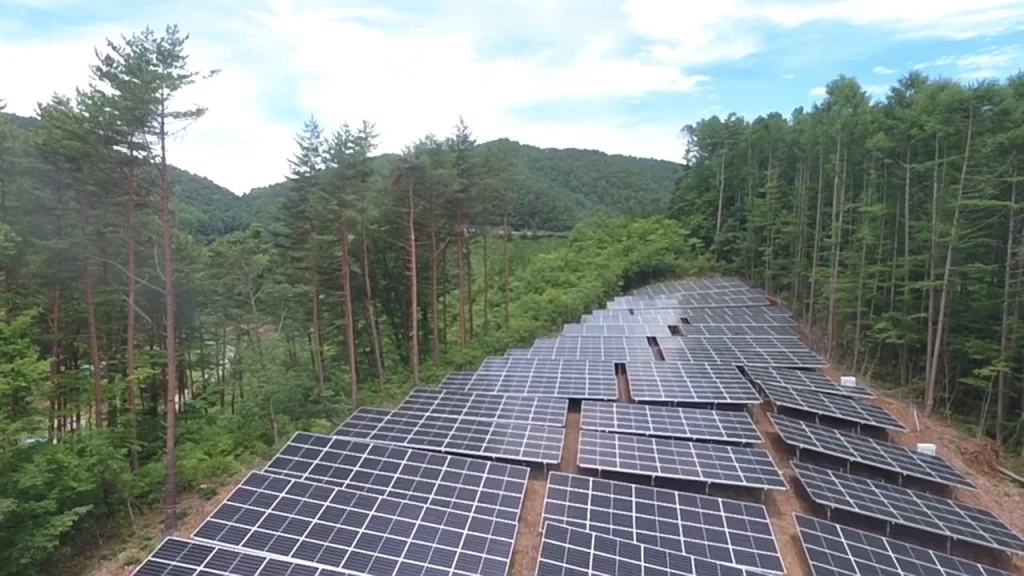 Large scale industrial utility racking systems designed and manufactured factory-direct by SR Solar for a hillside project.