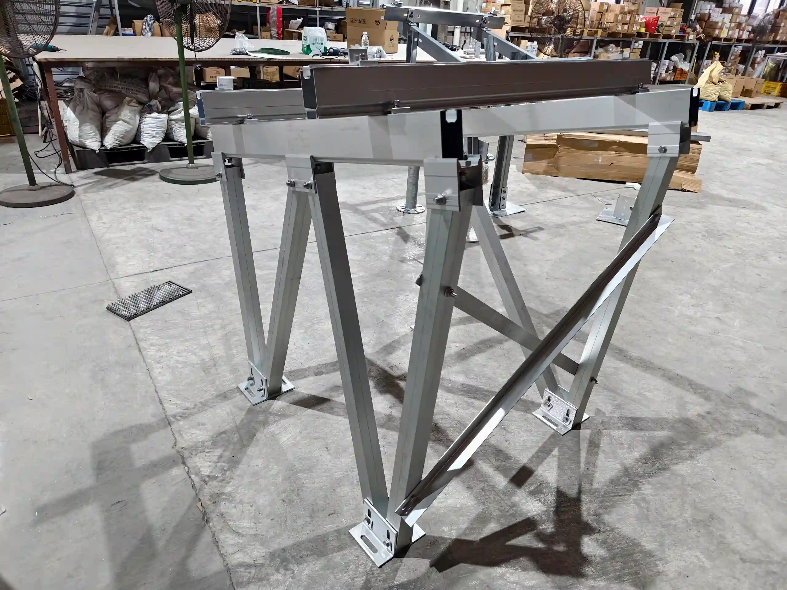 Pre-assembled aluminum triangle solar mounting frame inside the SR Solar factory