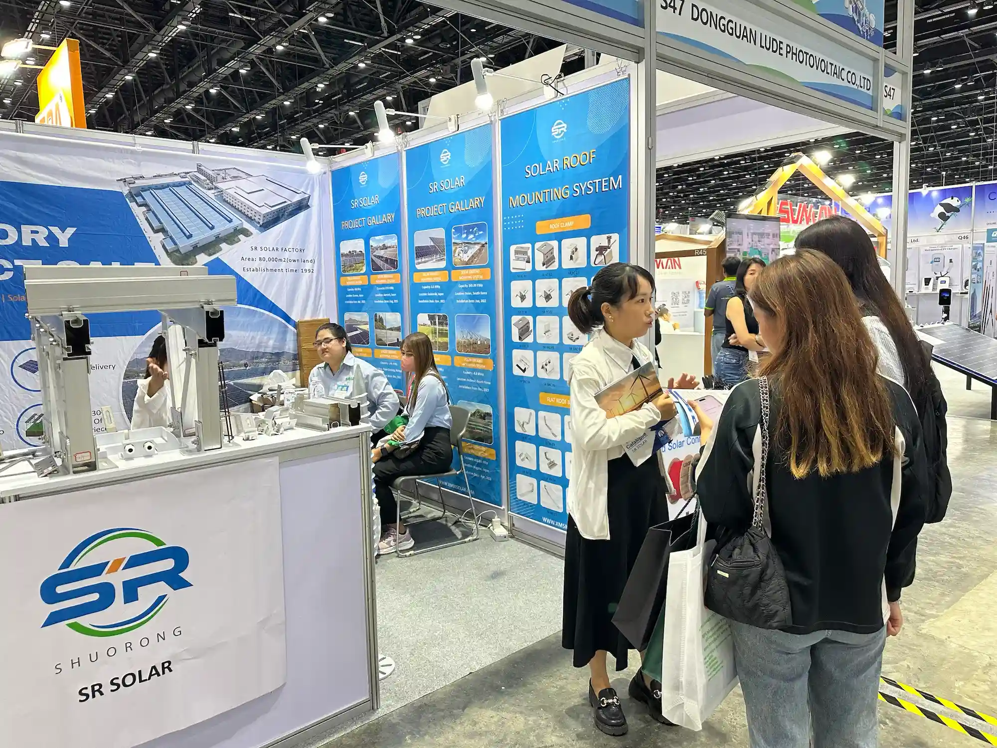 SR Solar technical team discussing customized OEM ODM solar mounting solutions with buyers in Thailand.