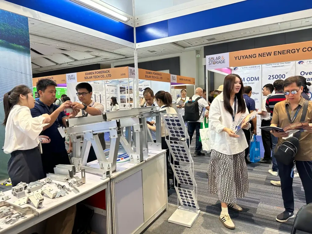 SR Solar aluminum solar racking samples and ground screw models on display at Philippines renewable energy exhibition.