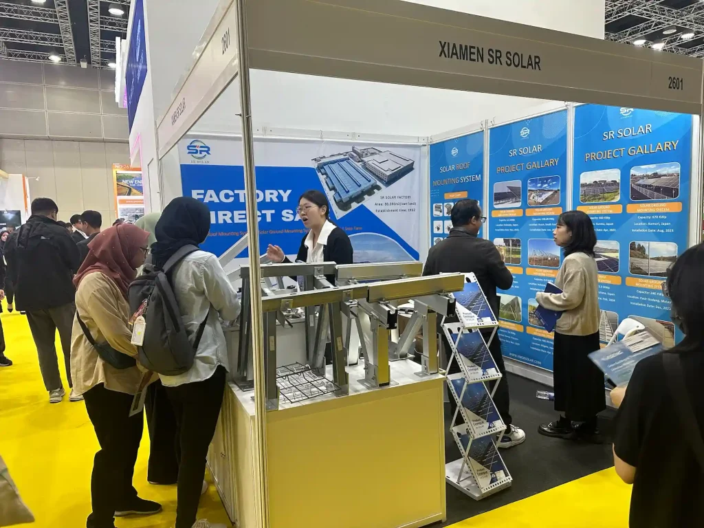 SR Solar exhibition booth at IGEM 2024 Malaysia showcasing solar roof mounting systems and project gallery.