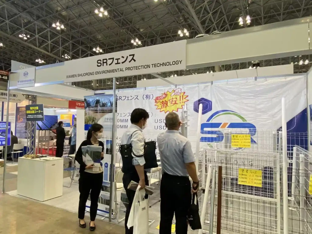 SR Solar team consulting with EPC contractors and distributors at PV EXPO Chiba Japan.