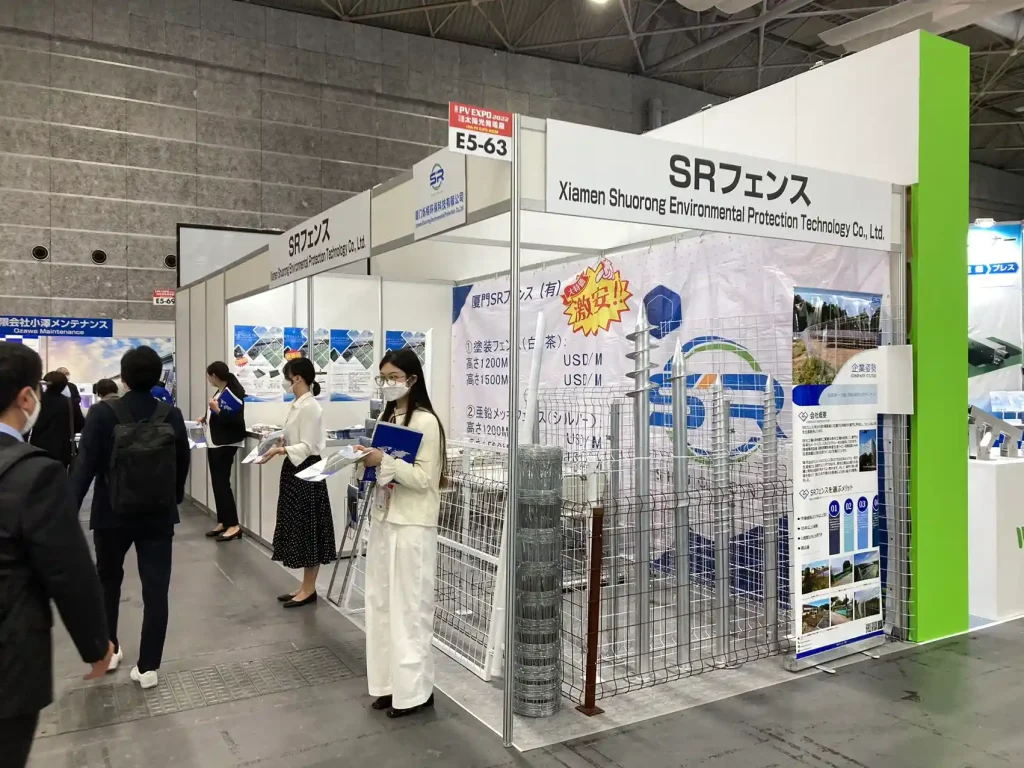 SR Solar exhibition display featuring ground screws and solar fencing hardware at PV EXPO Osaka.